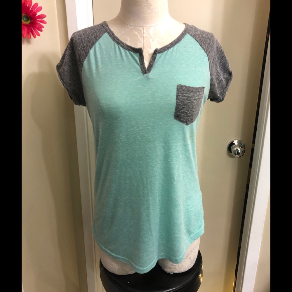 Short sleeved foam green and grey single pocket jersey style top